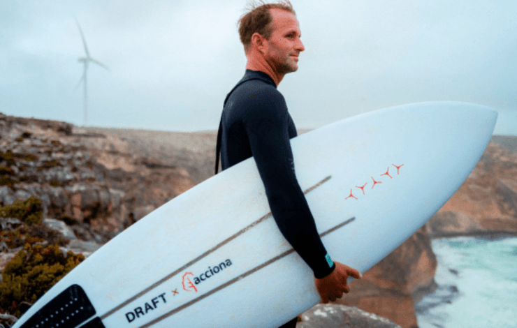 Man holding a surfboard