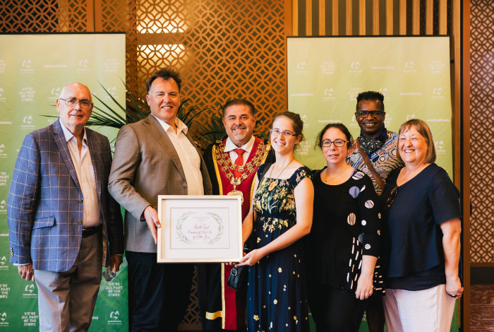 photo of group receiving an award