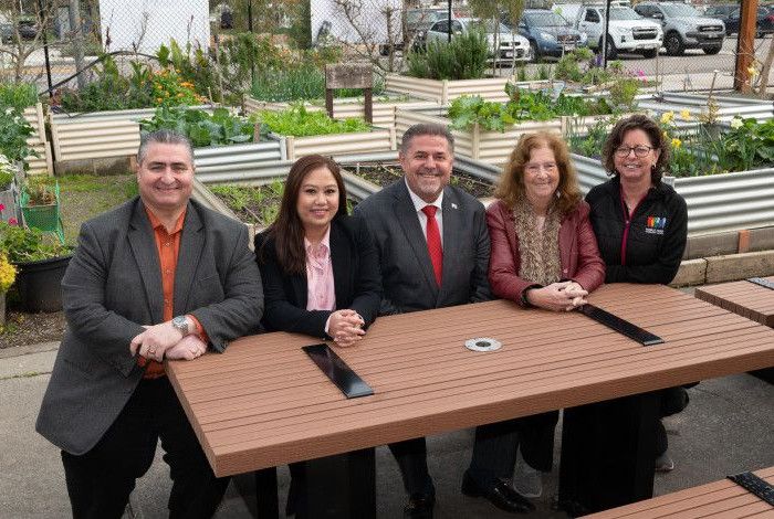 People sitting at an outdoor table