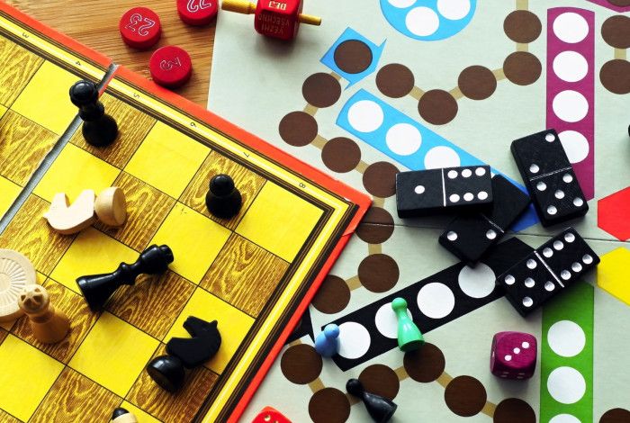 Board games in progress on a table.