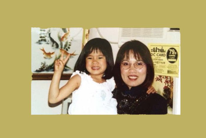 A mother and child smiling