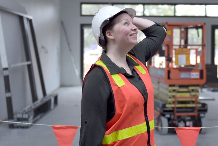 Coordinator Building Projects, Samantha Ackland lady looking at a project