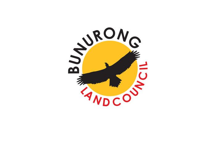 Bunurong Land Council logo black bird on yellow circle