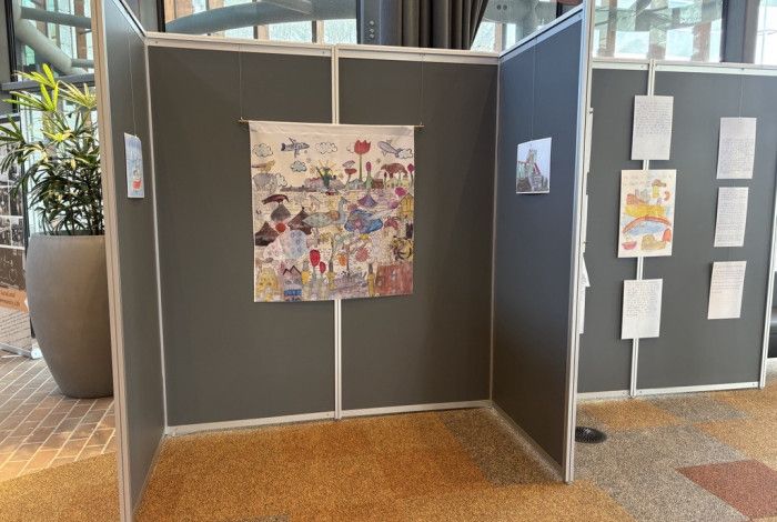Children's artwork displayed on panel at WOW Childnre's exhibtion