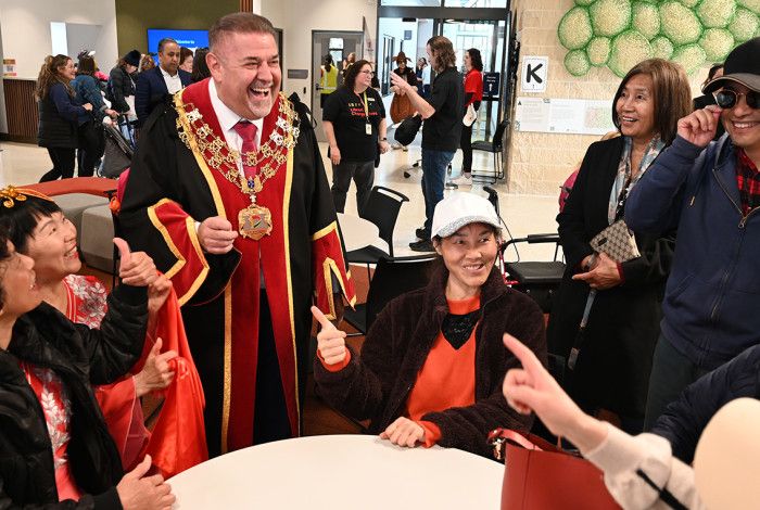 Mayor Cr Jim Memeti at the Community Hub opening with other people