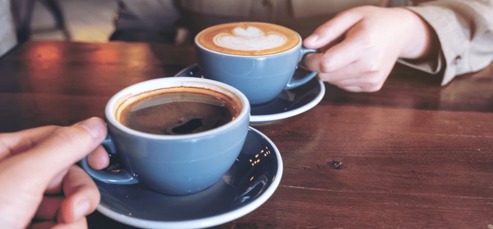 two coffees on a table