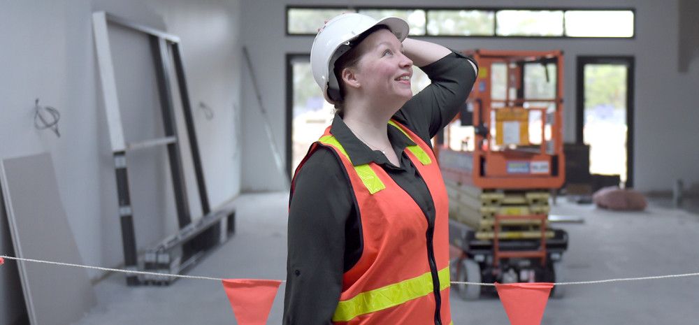 Coordinator Building Projects, Samantha Ackland lady looking at a project