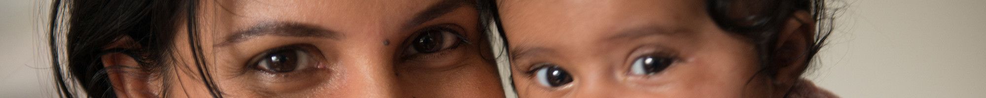 Mum and baby smiling