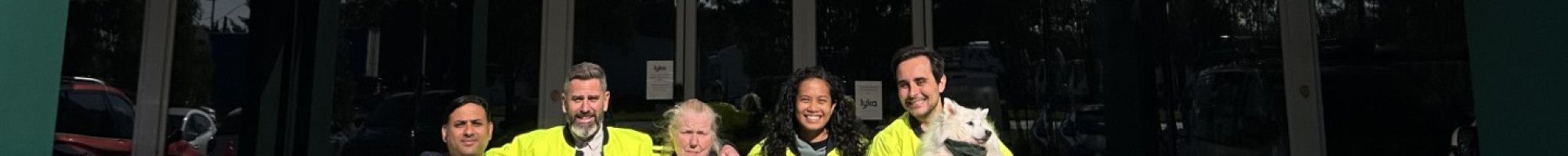 Lyka team members and dogs.