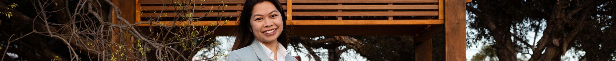 Councillor Melinda Yim standing in a park
