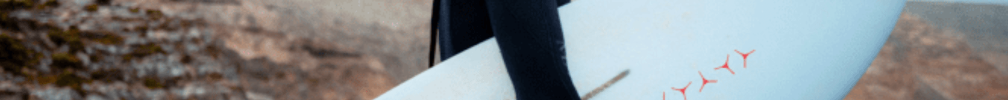 Man holding a surfboard