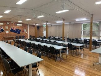 Interior of hall with tables and chairs