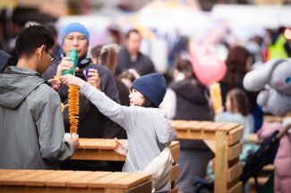 Child eating a twisted potato